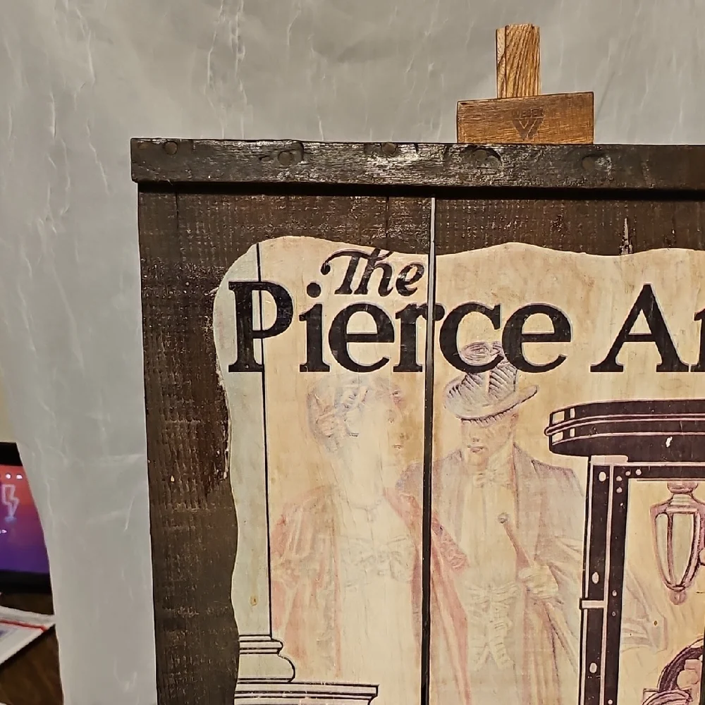 Vintage Pierce Arrow Car Advertisement On Rustic Wood